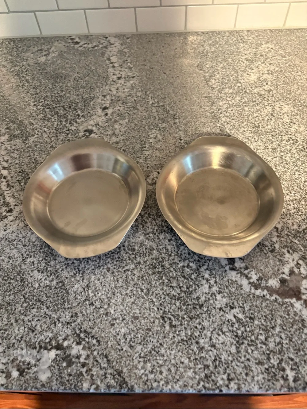 Set of two copper coated oval bowls